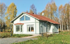 a small white house with a red roof at Awesome Home In Lysvik With 1 Bedrooms in Lysvik