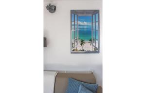 a window with a view of the beach at Beautiful Home In Bruinisse With Wifi in Bruinisse