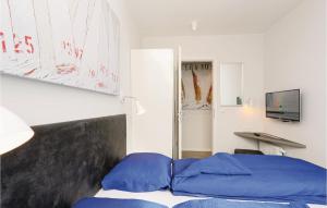 Ein Bett oder Betten in einem Zimmer der Unterkunft Passatvilla - Apartment 6