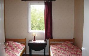 Postel nebo postele na pokoji v ubytování Stunning Home In Visby With Kitchen