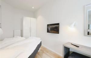 Ein Bett oder Betten in einem Zimmer der Unterkunft Highend Travemünde - Whg 202