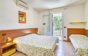 En eller flere senge i et værelse på Ai Pini-Villa