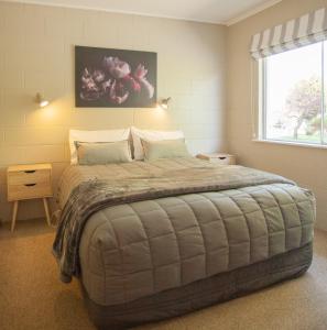 Ένα ή περισσότερα κρεβάτια σε δωμάτιο στο Ranfurly Motels