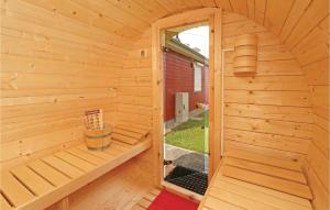 an inside view of a wooden sauna at Cozy Home In Zerpenschleuse With Sauna in Zerpenschleuse
