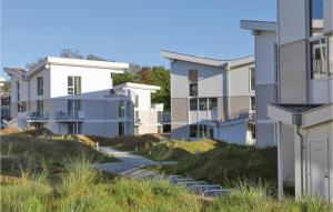a row of houses on the beach at Dünenvilla 14, Whg 6 in Priwall