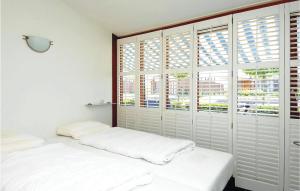 Cama o camas de una habitación en Bungalowpark Wijdland - Aak