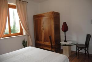 Postel nebo postele na pokoji v ubytování Vista Assisi + 19 fotografií
