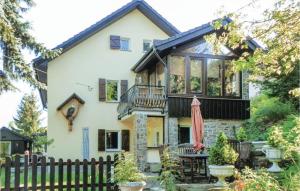 a house with a black roof at Pet Friendly Apartment In Freiberg in Freiberg