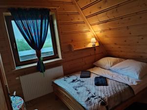 Postel nebo postele na pokoji v ubytování Dom Cypryda