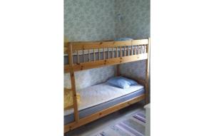a bunk bed in a room at 1 Bedroom Stunning Home In Svanesund in Svanesund