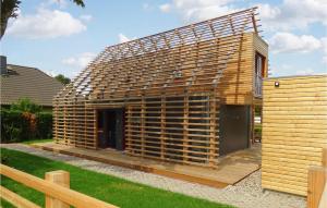 a wooden house is being built in a yard at Haus 8 in Wendorf +16 photos