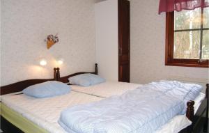 Postel nebo postele na pokoji v ubytování Holiday Home Siriusv, Yngsjö