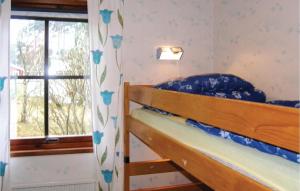 Postel nebo postele na pokoji v ubytování Holiday Home Siriusv, Yngsjö