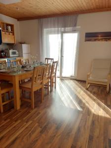 Kuchyňa alebo kuchynka v ubytovaní Sigi Apartment