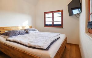 Tempat tidur dalam kamar di Kellerstoeckl Suedburgenland