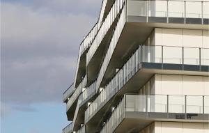 an external view of a building with glass balconies at Highend Travemünde - Whg 611 in Travemünde
