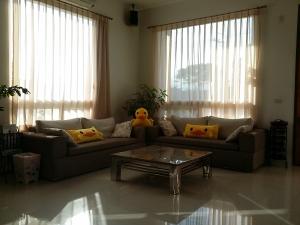 Posezení v ubytování Jing Xiang Hua Nong B&B