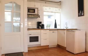 Η κουζίνα ή μικρή κουζίνα στο Vakantiewoning 12