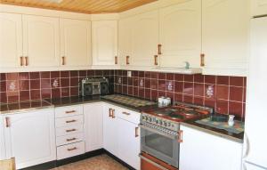 A kitchen or kitchenette at Stunning Home In Kalv With Kitchen