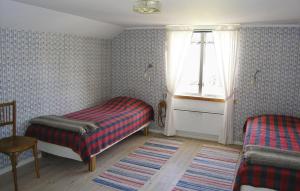 Cama ou camas em um quarto em 4 Bedroom Nice Home In Bottnaryd