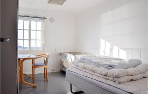 Voodi või voodid majutusasutuse 5 Bedroom Lovely Home In Mandal toas