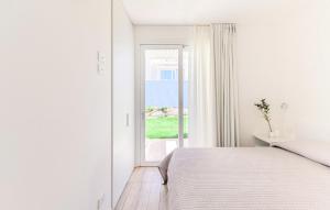 A bed or beds in a room at Bilo 4 Premium