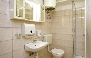 Kúpeľňa v ubytovaní Apartment Kastel Sucurac Ivana Pavla Ii,
