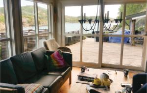 พื้นที่นั่งเล่นของ Holiday Home Mandal Skjernøysund