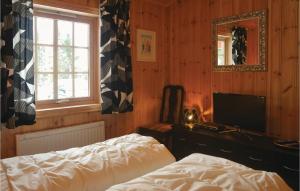 โทรทัศน์และ/หรือระบบความบันเทิงของ Cozy Home In Sjusjøen