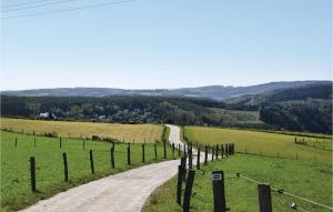 a dirt road in the middle of a field at Nadrin O Vert in Nadrin