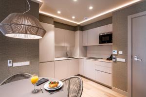 Kuchyňa alebo kuchynka v ubytovaní Apartamentos Core Suites Valencia