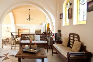 a living room with a couch and a table at Elizabeth Hotel in Athens