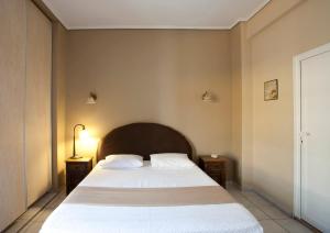 Ένα ή περισσότερα κρεβάτια σε δωμάτιο στο Elizabeth Hotel 