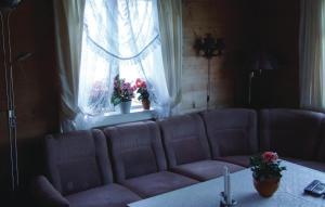 Et opholdsområde på Holiday Home Sørbøvåg Sandnes + 6 billeder