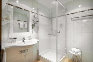 Kúpeľňa v ubytovaní Apartments Tschanun
