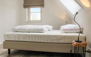 Een bed of bedden in een kamer bij Oeral Thús