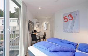 Postel nebo postele na pokoji v ubytování Dünenvilla 13, Whg 4 + 17 fotografií