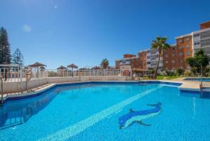 Bazén v ubytování Ático con vistas panorámicas en Torremolinos nebo v jeho okolí