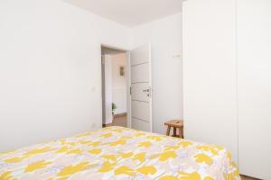 Łóżko lub łóżka w pokoju w obiekcie Apartment Bruneta 2 with Terrace