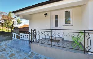 a balcony of a house with a black railing at Cozy Apartment In Piran With Wifi in Piran
