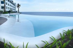 Bazén v ubytování Royal Avila Boutique Resort nebo v jeho okolí