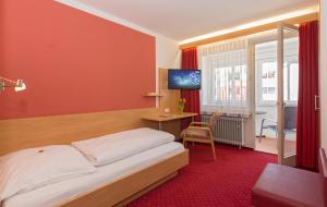 Postel nebo postele na pokoji v ubytování Hotel Jägerhaus