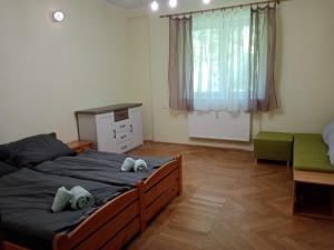 Postel nebo postele na pokoji v ubytování Apartmán XXL