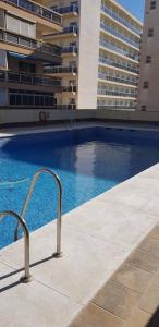 Bazén v ubytovaní Holidays2Torremolinos Studio in Loma del Colegial Torremolinos close to center with pool, rooftop terrace alebo v jeho blízkosti