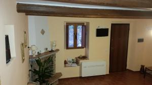 TV a/nebo společenská místnost v ubytování B&B Dhafna + 33 fotografií