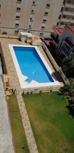 Bazén v ubytovaní Holidays2Torremolinos Studio in Loma del Colegial Torremolinos close to center with pool, rooftop terrace alebo v jeho blízkosti