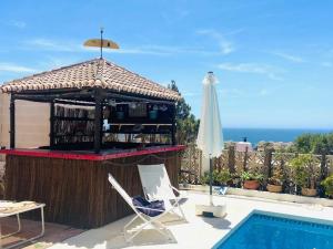 Bazén v ubytování Casa Geneviève Costa del Sol nebo v jeho okolí