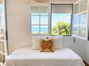 Postel nebo postele na pokoji v ubytování Casa Geneviève Costa del Sol