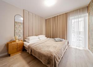 Postel nebo postele na pokoji v ubytování Pokoje Gościnne Hafen Guesthouse - Władysławowo