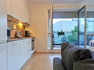 Kuchyň nebo kuchyňský kout v ubytování Scandian Apartments - City Hub Tallinn